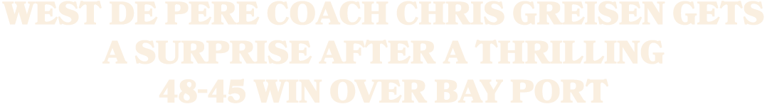 West De Pere coach Chris Greisen gets a surprise after a thrilling 48 45 win over Bay Port