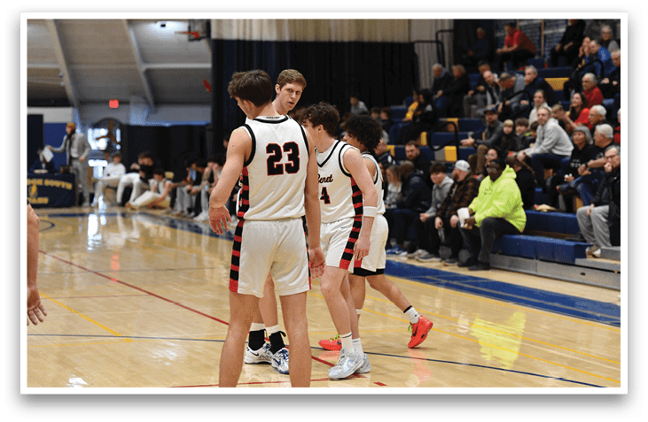 A group of men playing basketball on a court. AI generated content