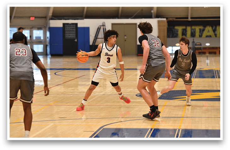 A group of young men playing basketball on a court. AI generated content