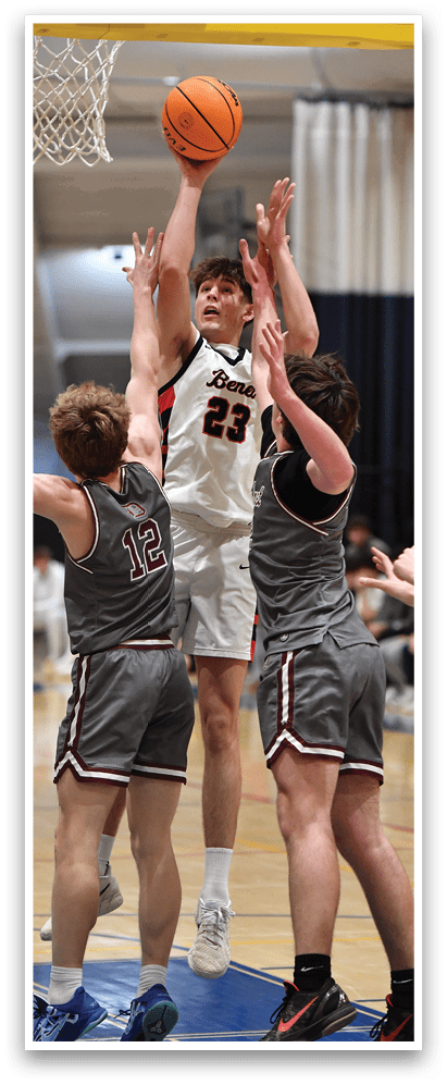 A group of men playing basketball, with one man jumping to block a shot. AI generated content