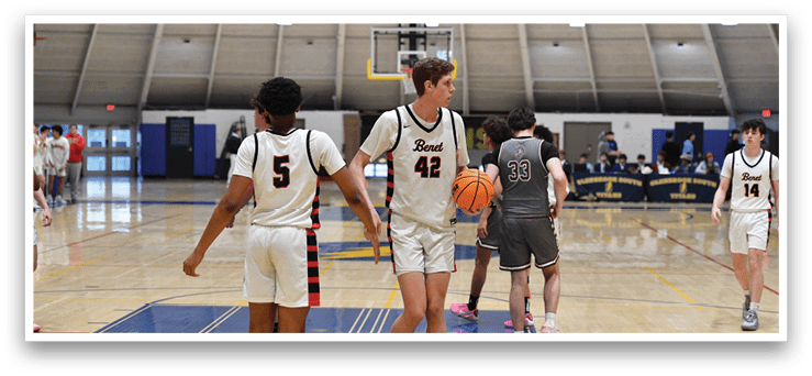 A group of basketball players on a court, one of them holding a basketball. AI generated content