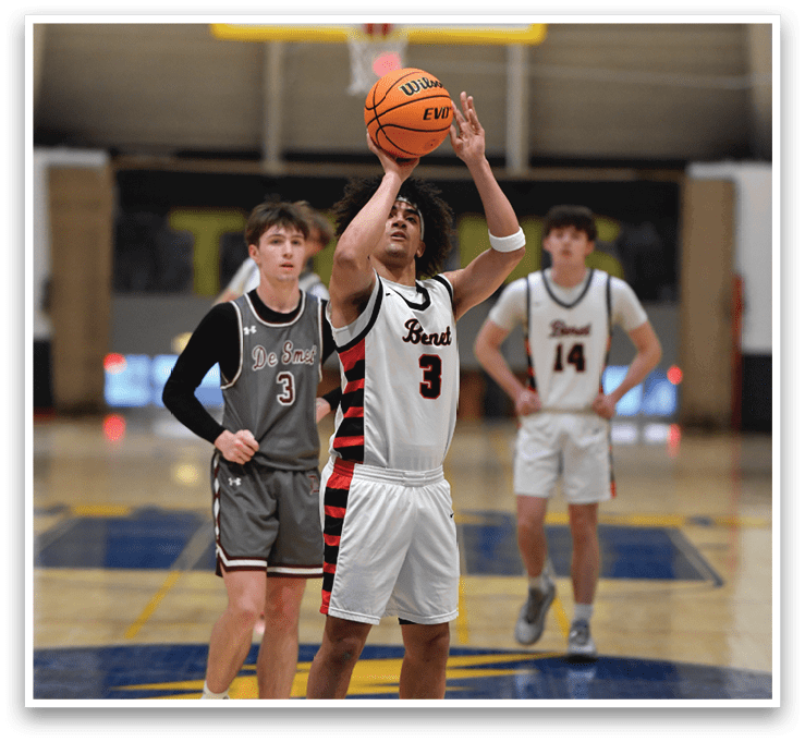 Two basketball players are playing in a gym. One player is holding a basketball while the other player is running. AI generated content