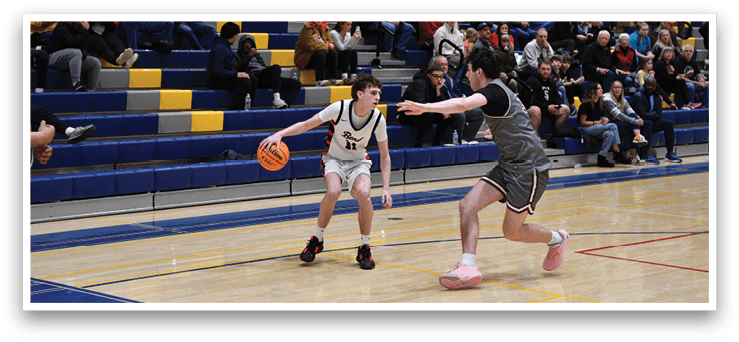Two young men playing basketball on a court, one holding a basketball and the other trying to block him. AI generated content