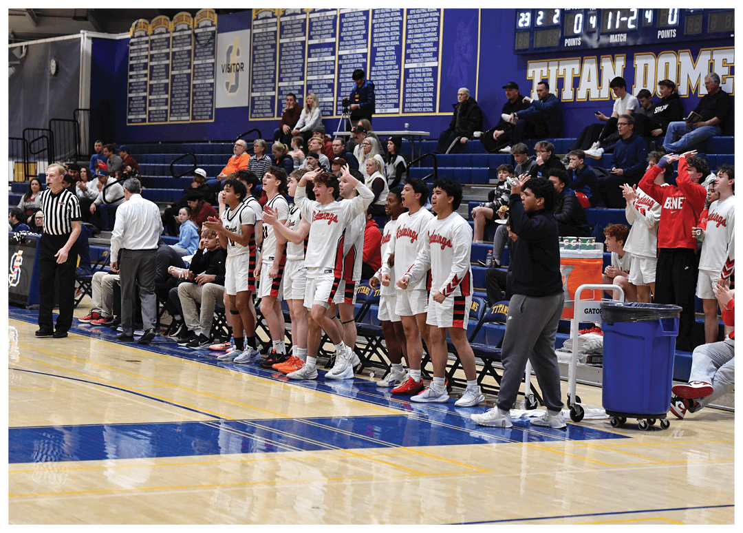 A group of people are standing on a basketball court, some of them holding their hands up. AI generated content