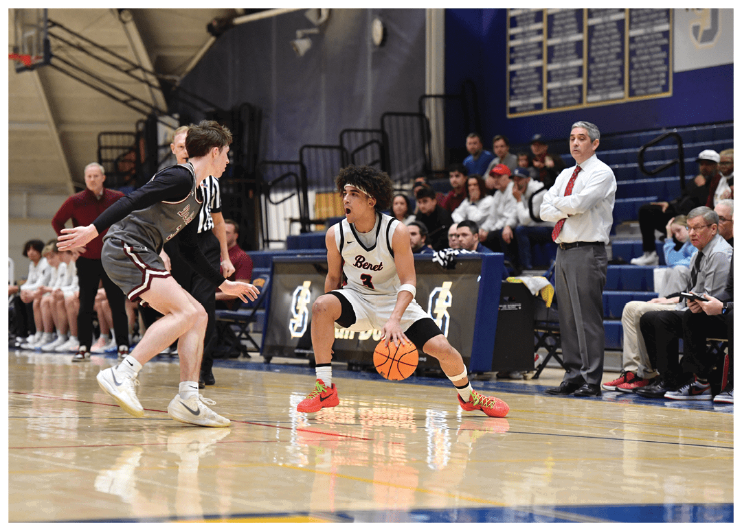 A basketball player is dribbling the ball while another player tries to block him. The scene takes place in a gym with several people watching. AI generated content