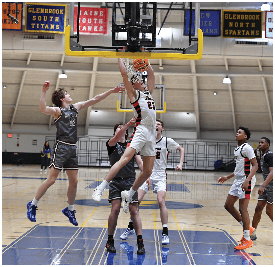 A group of men playing basketball, one of them jumping to block a shot. AI generated content