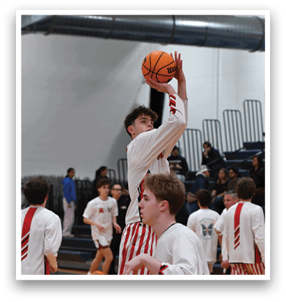 A group of basketball players are on the court, some of them wearing striped pants. AI generated content