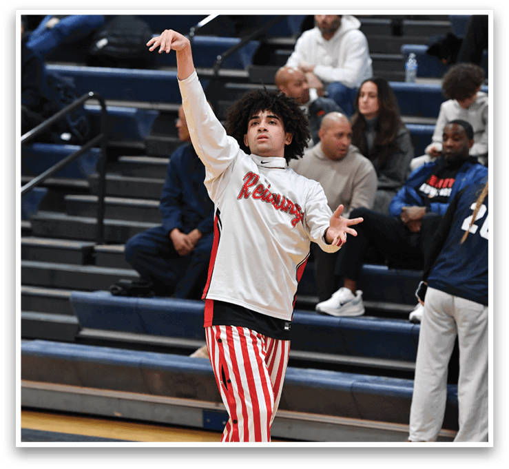 A person wearing a white and red striped outfit is holding a basketball in their hands. AI generated content