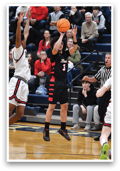 A basketball player is reaching for the ball while a referee looks on. AI generated content