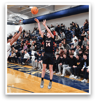 Two basketball players are playing in front of a crowd. One player is attempting to block the shot of the other player. The crowd is watching intently as the players compete. AI generated content