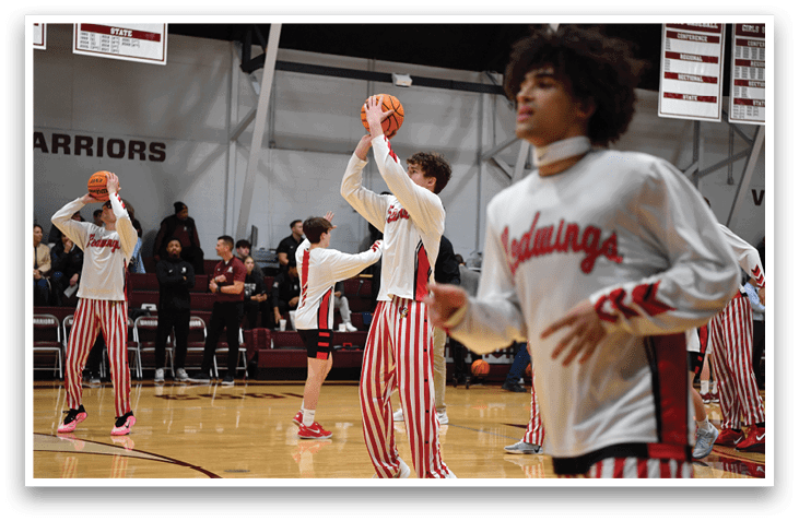 A group of men in striped pants are playing basketball. AI generated content