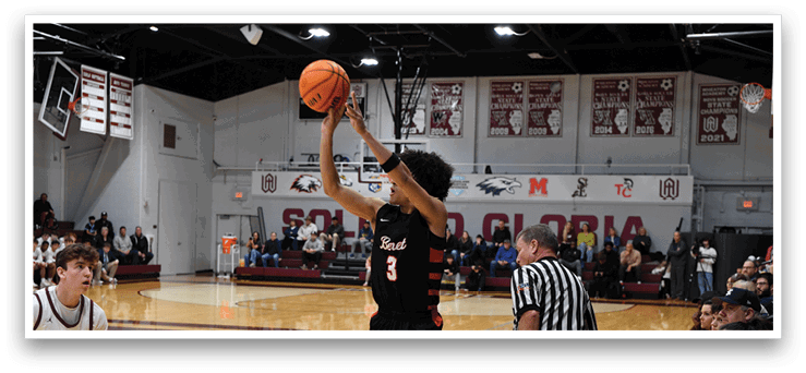 A basketball player is jumping up to shoot the ball while a referee looks on. AI generated content