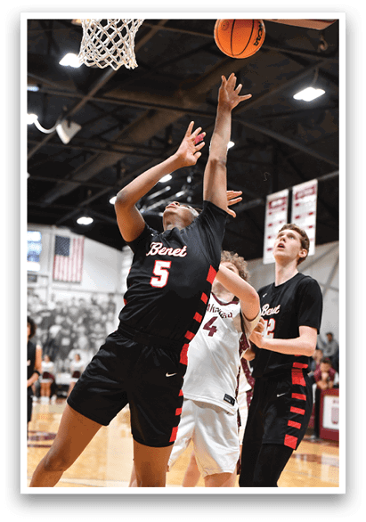 Two basketball players are playing in a game. One player is reaching for the ball while the other player is trying to block the shot. AI generated content
