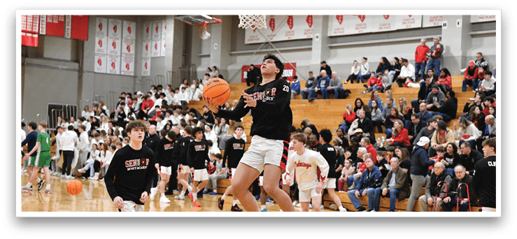 A basketball player jumps in the air to catch the ball. AI generated content