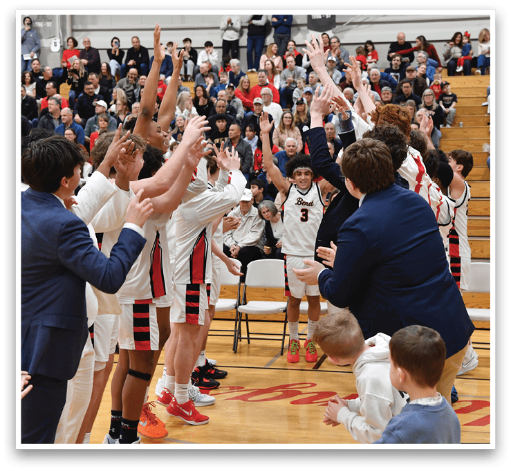 A group of young men celebrating a victory on the basketball court. AI generated content