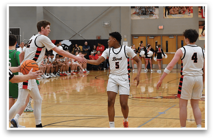 A group of men playing basketball in a gym. AI generated content