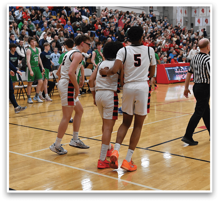 Basketball players hugging on the court. AI generated content