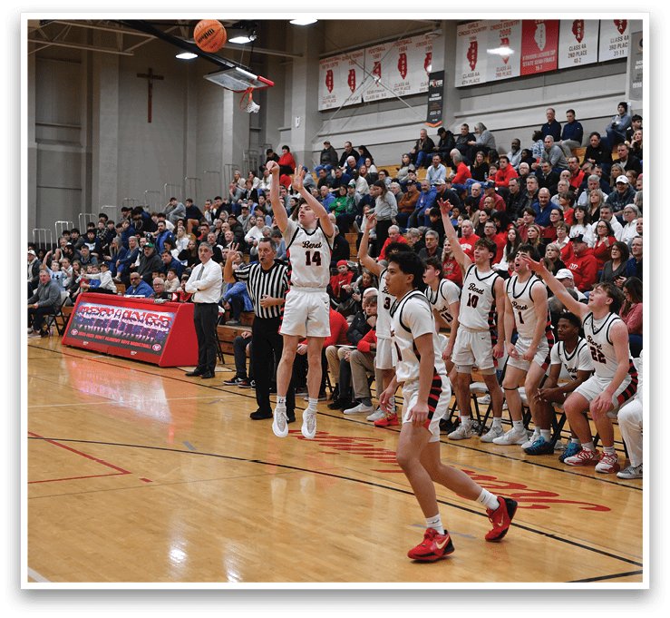 A basketball game is taking place with a player in the air attempting to shoot the ball. The crowd is watching intently as the players compete. AI generated content