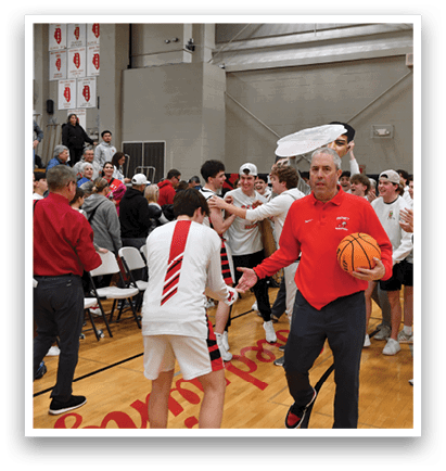 A group of people are celebrating a victory on a basketball court. AI generated content