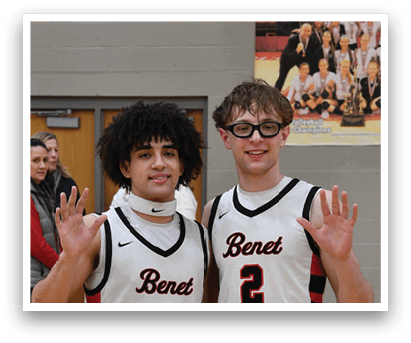 Two basketball players wearing white uniforms and black socks stand on a court. AI generated content