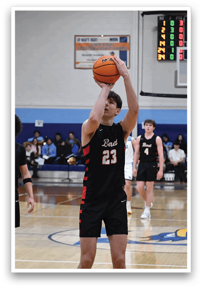 A basketball player in a black shirt and shorts is attempting to shoot the ball. AI generated content