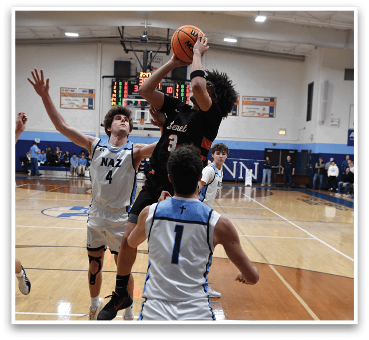 A group of men playing basketball on a court. One man is attempting to block a shot. AI generated content