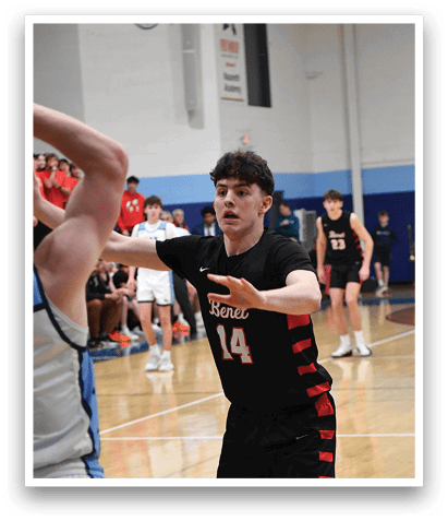Two men are playing basketball on a court. One man is holding a basketball while the other man is trying to block him. AI generated content