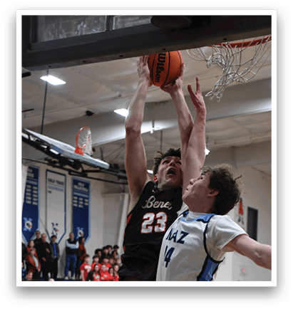 Two basketball players are fighting for a rebound, with one player reaching for the ball. AI generated content