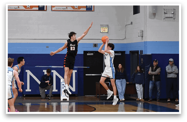 A basketball game is in progress with players on the court and spectators in the stands. AI generated content