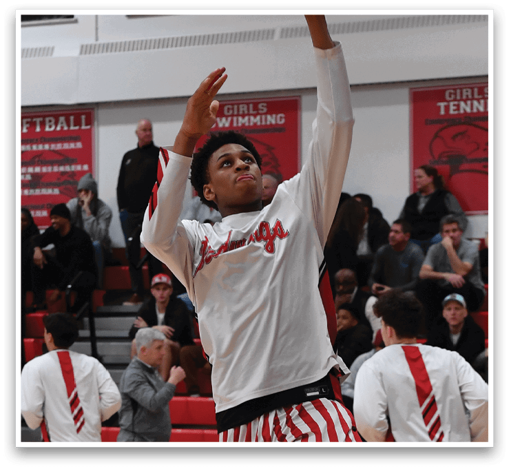 A basketball player in a white shirt and red and white striped pants is jumping to shoot a basket. AI generated content