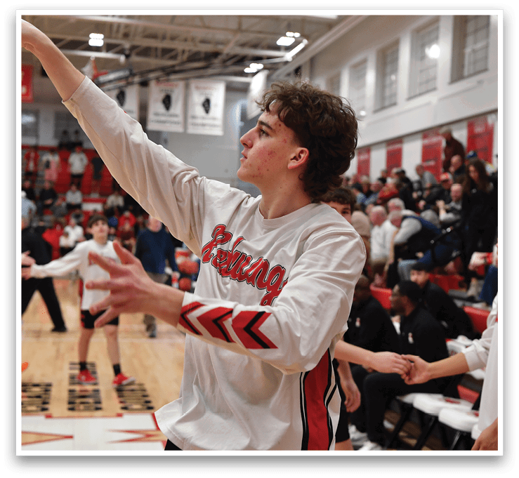 A basketball player in a white shirt and black shorts is holding the ball in his hand, preparing to throw it. AI generated content