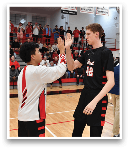 Two men high five each other on a basketball court. AI generated content