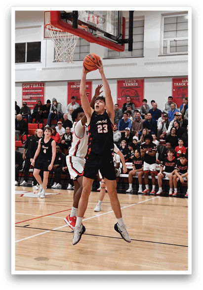 A basketball player leaps to block a shot, while the opposing team looks on. AI generated content