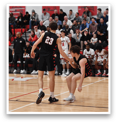 A group of men playing basketball on a court. AI generated content