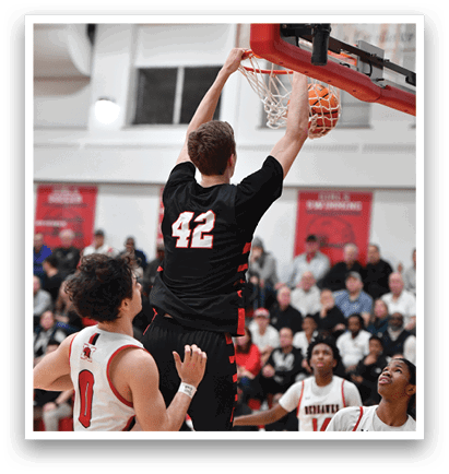 A basketball player is jumping to hit the ball, while the crowd watches. AI generated content