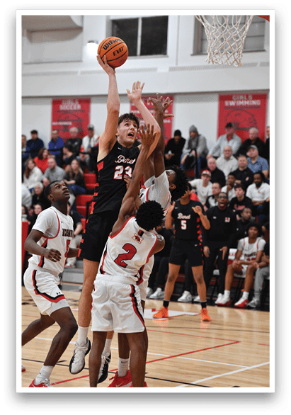 Two basketball players are fighting for the ball, with one player trying to block the other from getting the ball. The crowd is watching the intense play. AI generated content