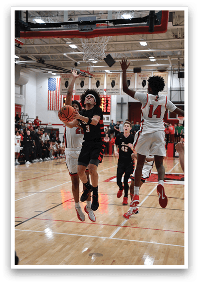 Basketball players on a court, one player is trying to block the shot of another player. AI generated content