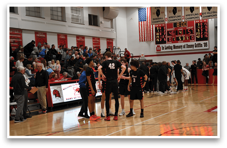 A group of young men are playing basketball on a court. AI generated content
