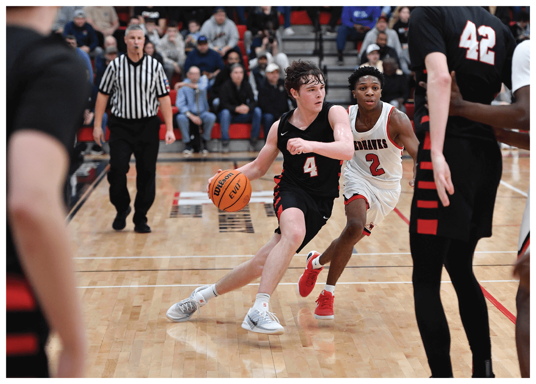 A basketball game is in progress with a player attempting to shoot the ball. AI generated content