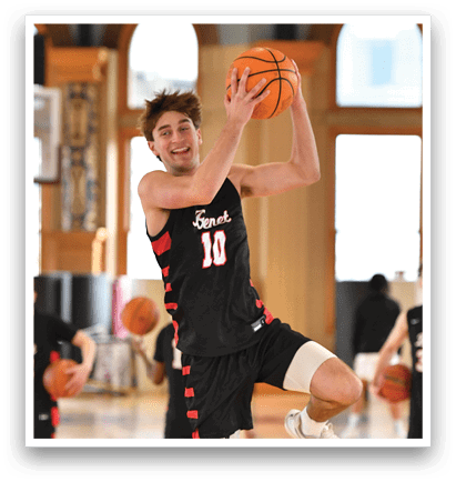 A basketball player wearing a black jersey with the number 10 shoots a basket. AI generated content
