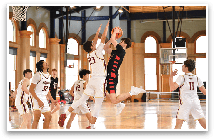 Basketball players in a gym, one player is jumping to block a shot. AI generated content