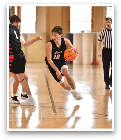 A basketball player is running with the ball while another player tries to block him. AI generated content