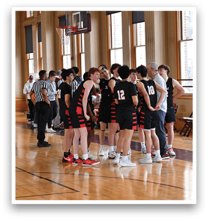 A group of young men wearing black jerseys are standing on a basketball court. AI generated content