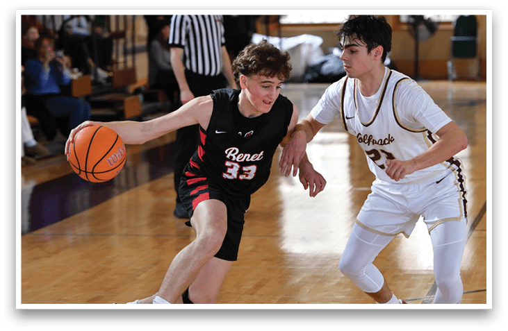 Two basketball players are on the court, one with a basketball in his hand and the other running towards him. AI generated content