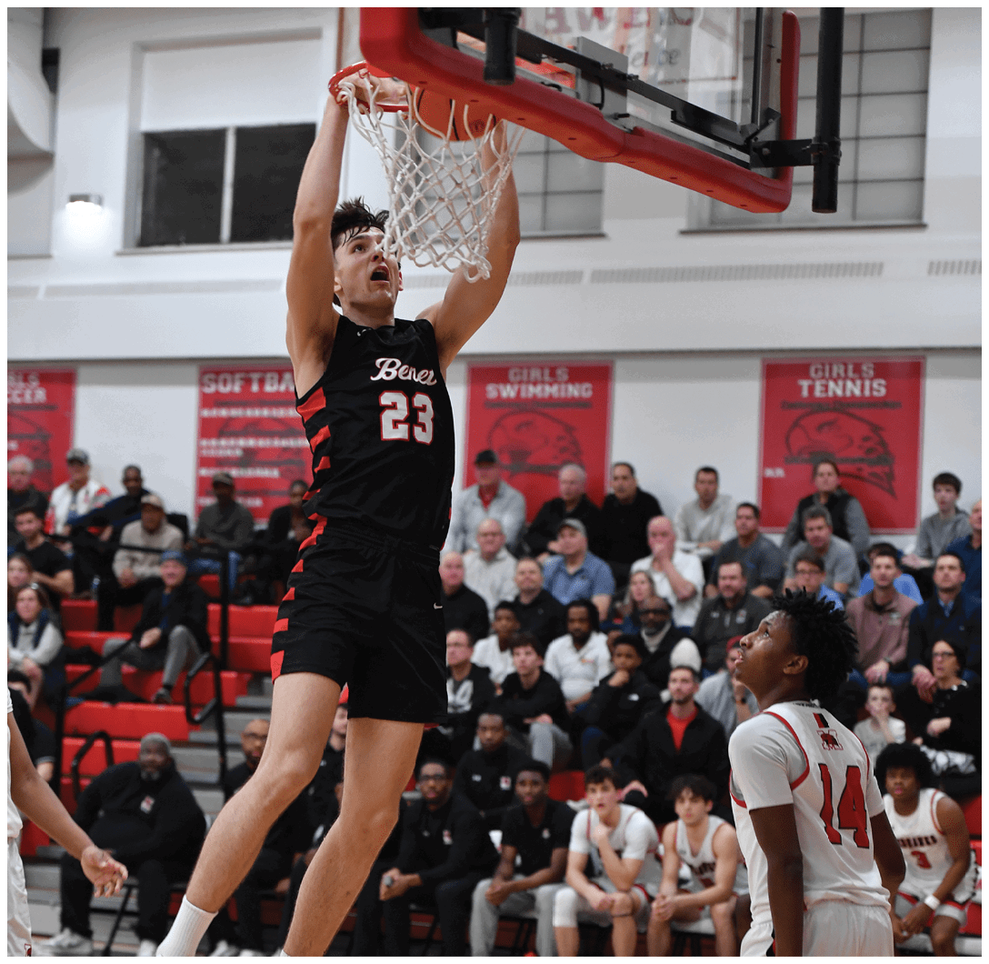 A basketball player is jumping in the air to score a basket. AI generated content