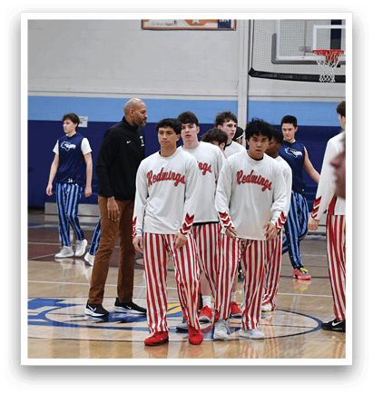 A group of young men playing basketball on a court. AI generated content