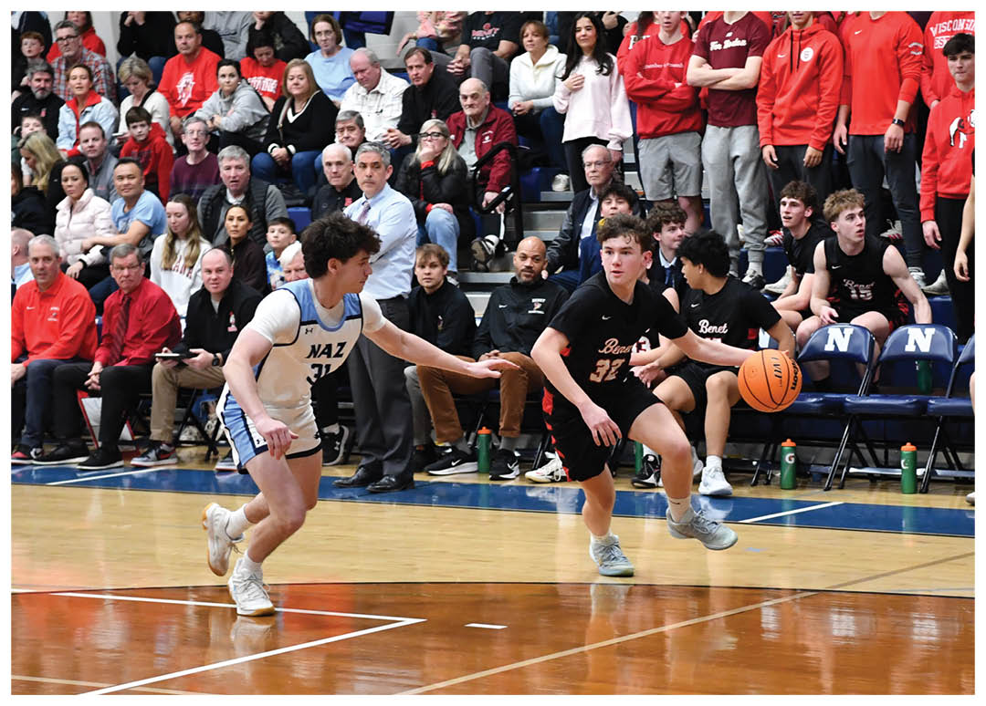 A basketball game is taking place with a group of people playing. The players are wearing red and white uniforms. The crowd is watching the game from the stands. AI generated content