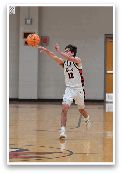 A basketball player in a white uniform is attempting to shoot the ball. AI generated content