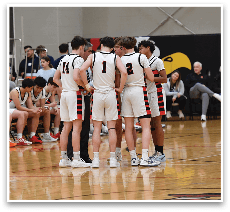 A group of young men are gathered on a basketball court, engaged in a conversation. AI generated content