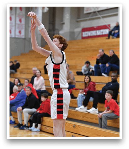 A basketball player is jumping up to catch the ball in a gym. AI generated content